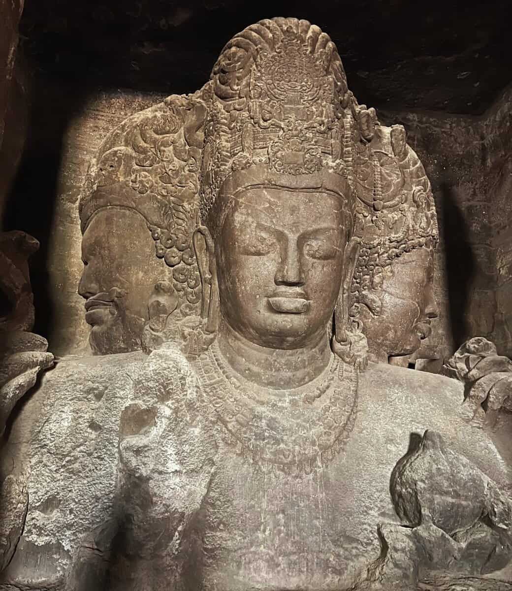 Sadashiva Trimurti sculpture inside Cave 1 at Elephanta Caves Mumbai